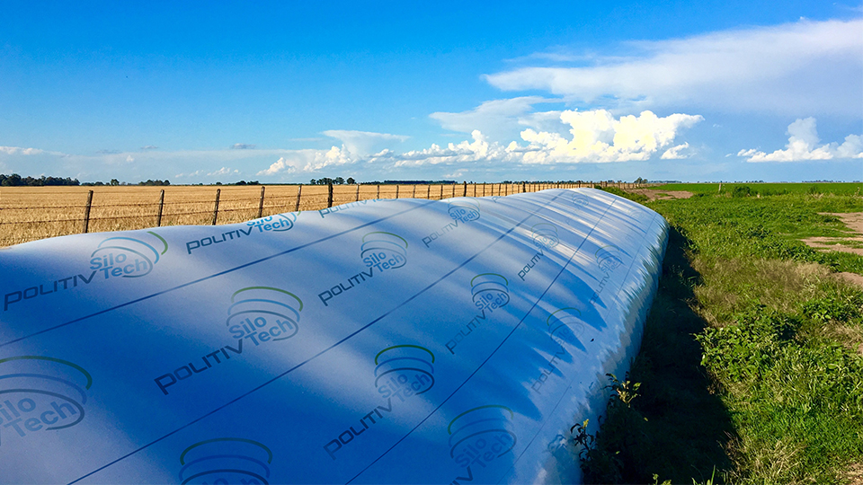 Silo Bag In A Farm With Fence And Field Rural Countryside Image  Agricultural Industry Scene Stock Photo - Download Image Now - iStock